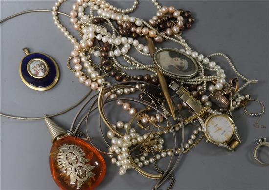 A 19th century gilt metal and enamel portrait pendant, two yellow metal bangles(a.f.) and a small group of costume jewellery
